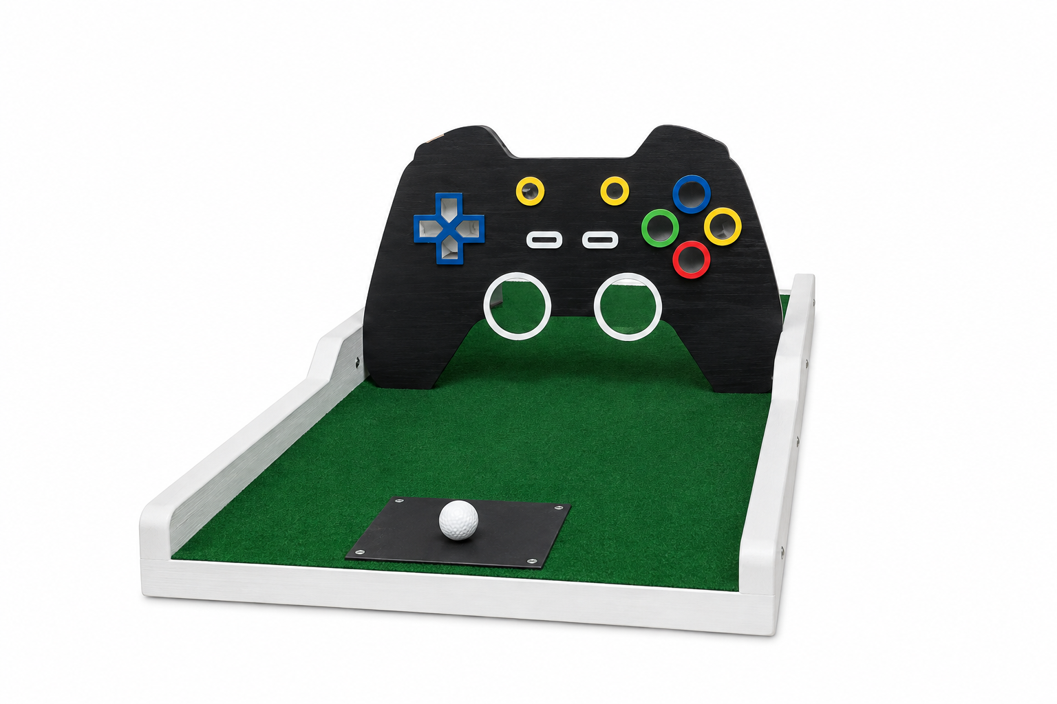 Gaming controller shaped mini golf obstacle on green turf